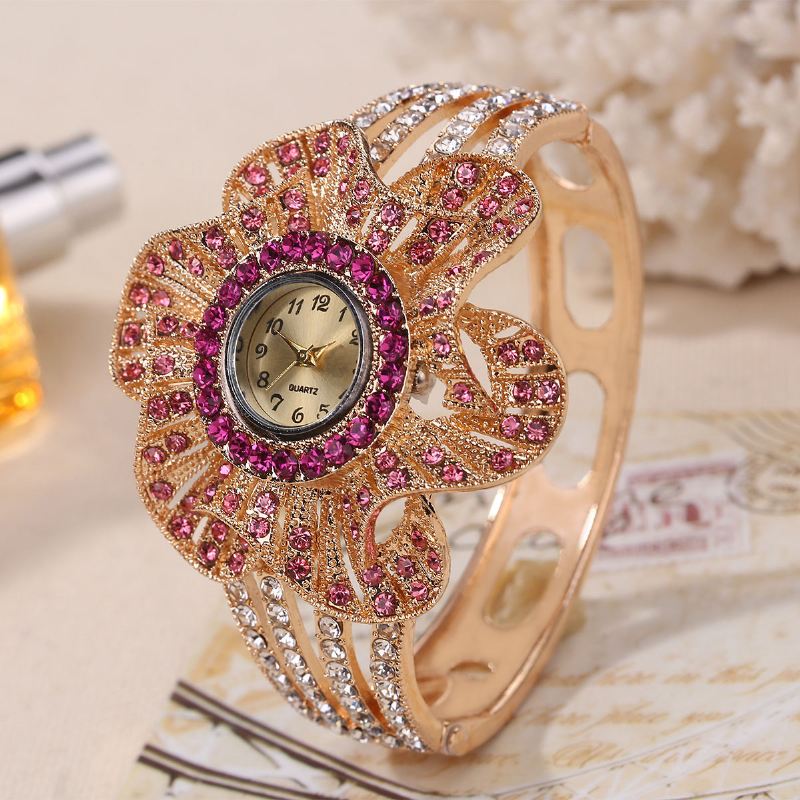 Mode Crystal Blomster Shape Dial Hollow Metal Strap Kvinder Quartz Watch